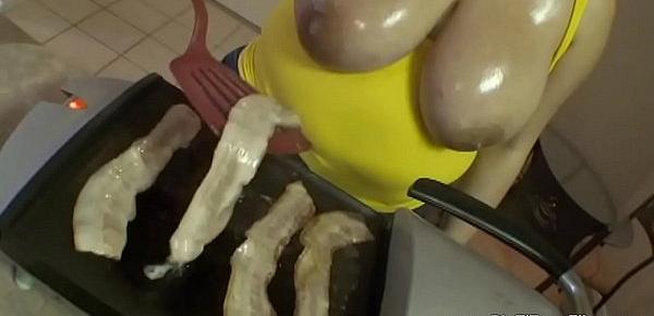  1187633 teen with huge natural 38f breasts cooks bacon and eggs